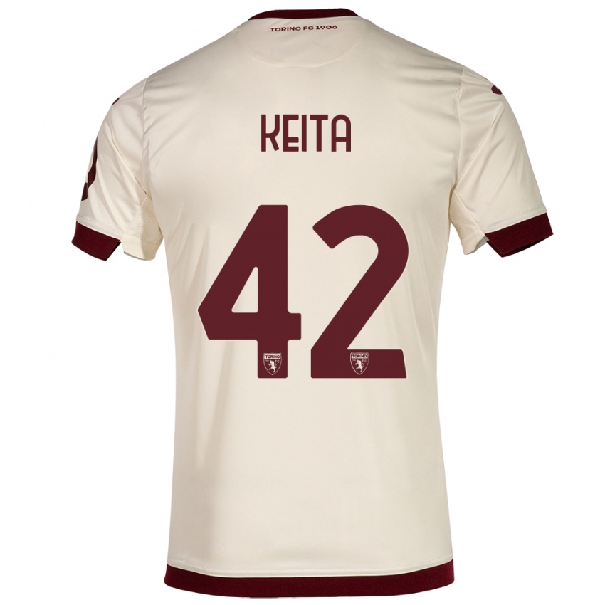 Dames Karamoko Keita #42 Champagne Uitshirt Uittenue 2023/24 T-Shirt